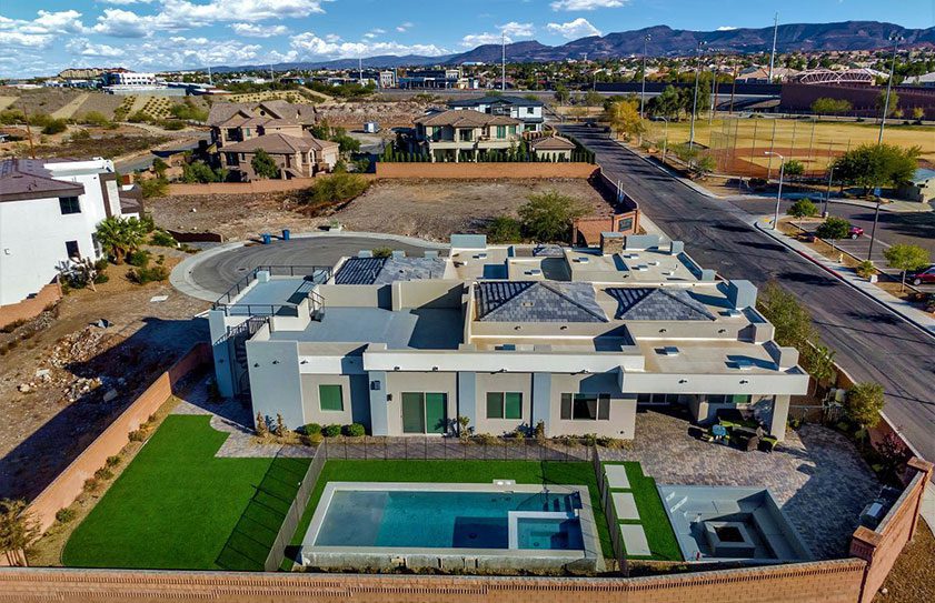New-construction-home-drone-photo-Las-Vegas-2 Drone photo of a large Las Vegas home with beautiful landscaping and pool.
