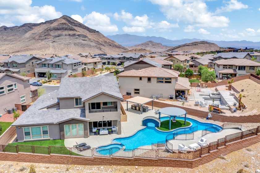 Drone photo of backyard pool Drone photo of amazing backyard with pool and island